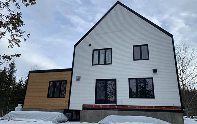Construction maison neuve et toiture Eastman.